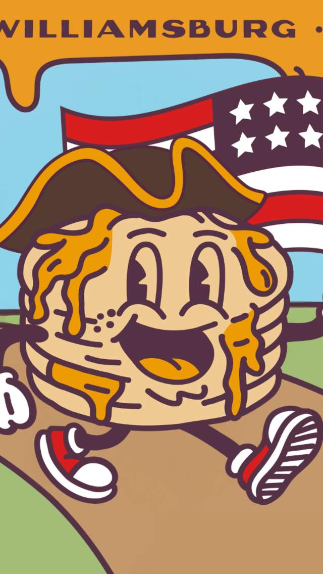 Short Stack pancake guy holding an American Flag. Join the Pancake Trail.