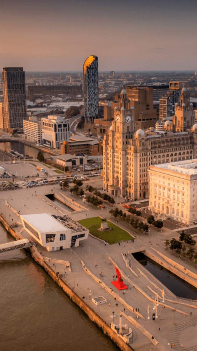 Liverpool's Pier Head waterfront taken at dusk, on a drone.