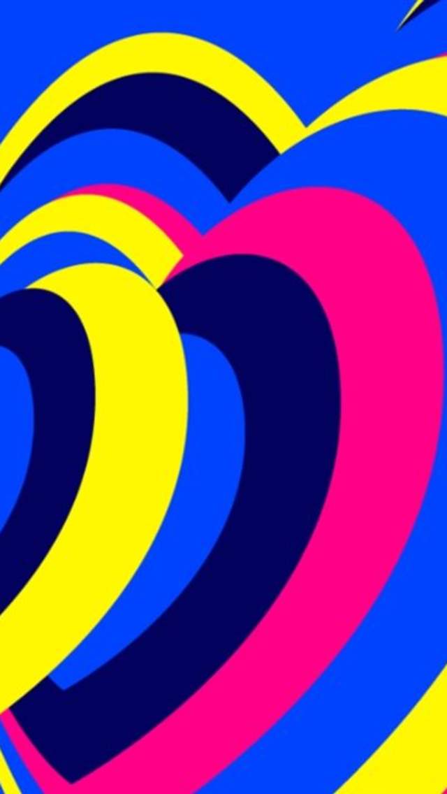 Pink, yellow and blue concentric hearts on a blue background.