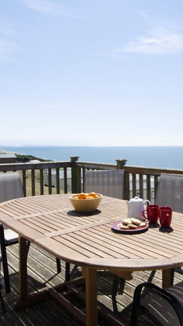 Sea views from the balcony at Cogden Cottages, near Burton Bradstock in Dorset