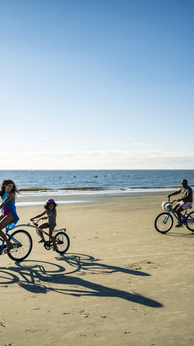The hard packed sands on St. Simons Island's East Beach makes it perfect for riding bikes.