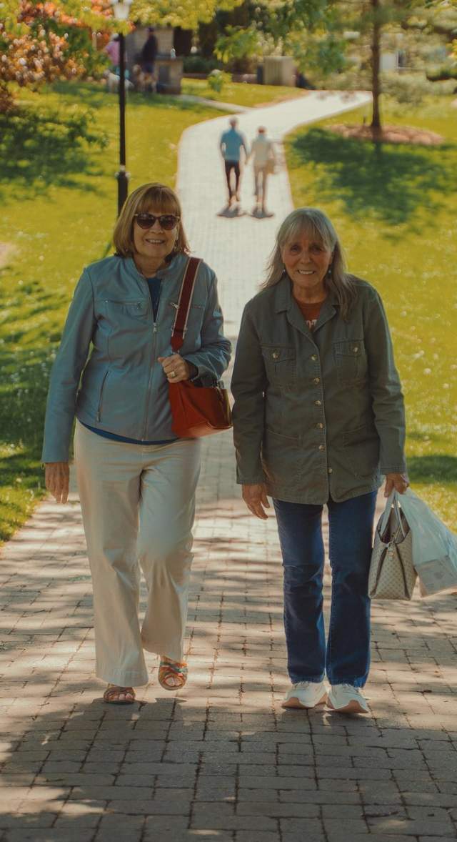 Old women walking on a park