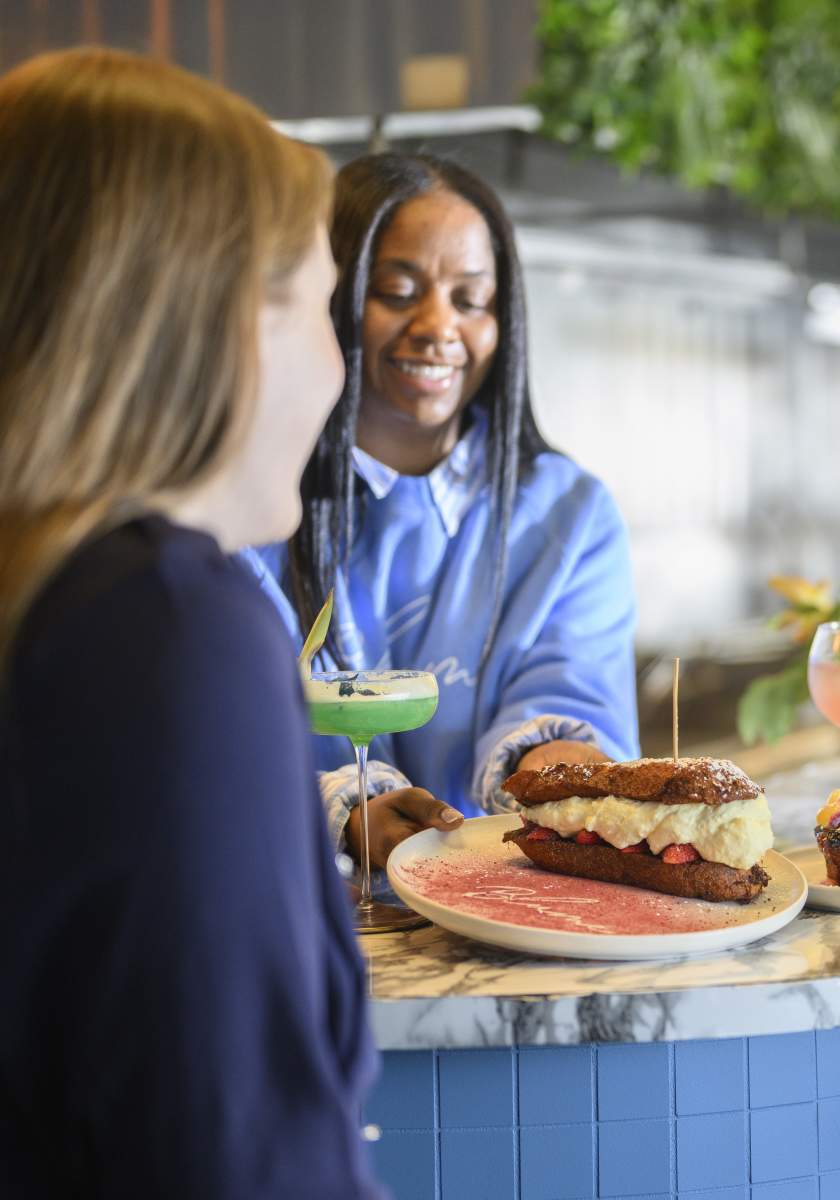 Group of Women enjoying food at Blume Restaurant in Greater Wilmington, Delaware
