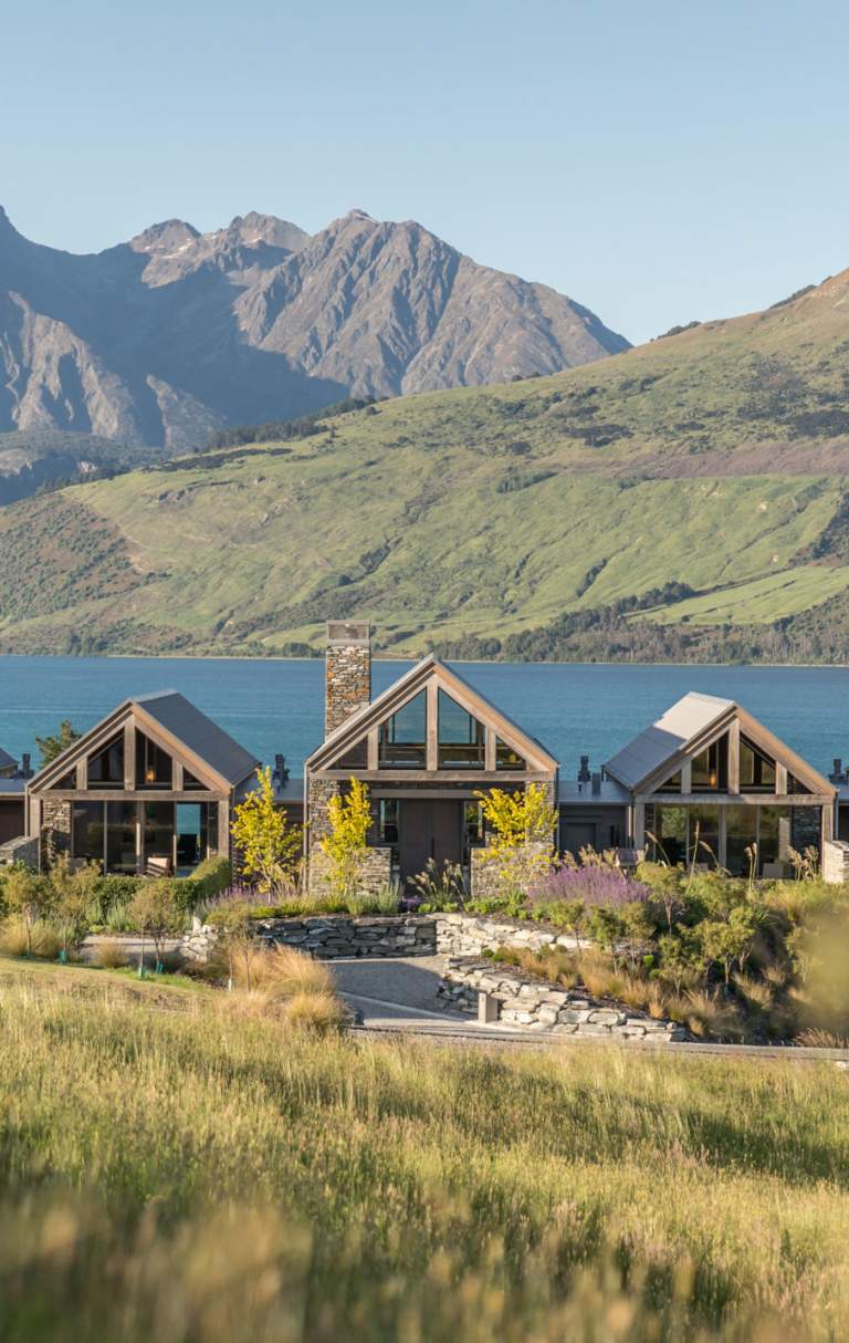 Blanket Bay Villas with mountain and lake backdrop