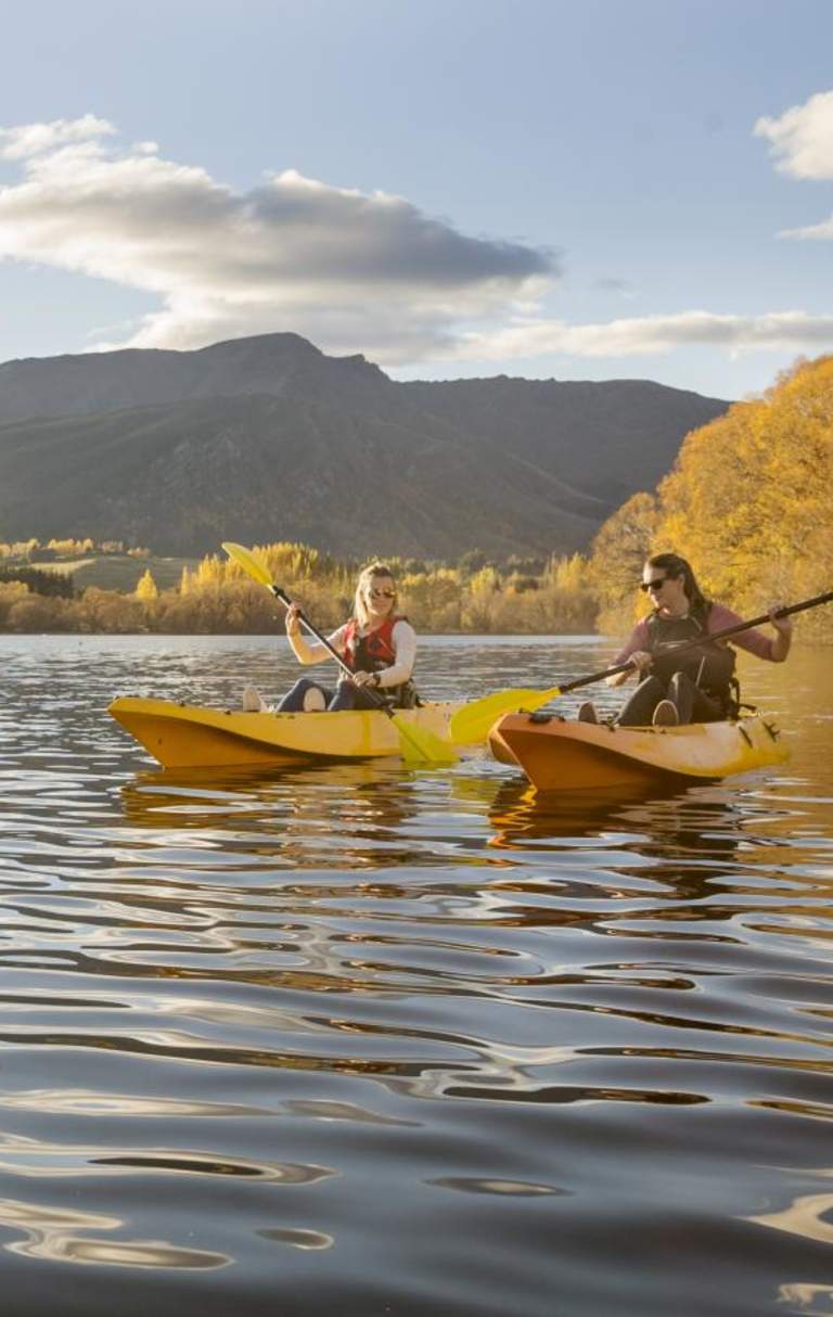 Friends Kayaking on Lake Hayes on an Autumn Day