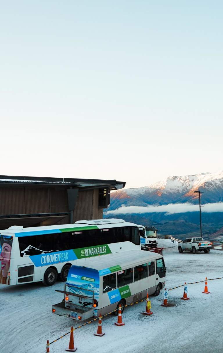Ski field bus transporting passengers to the base building at Coronet Peak