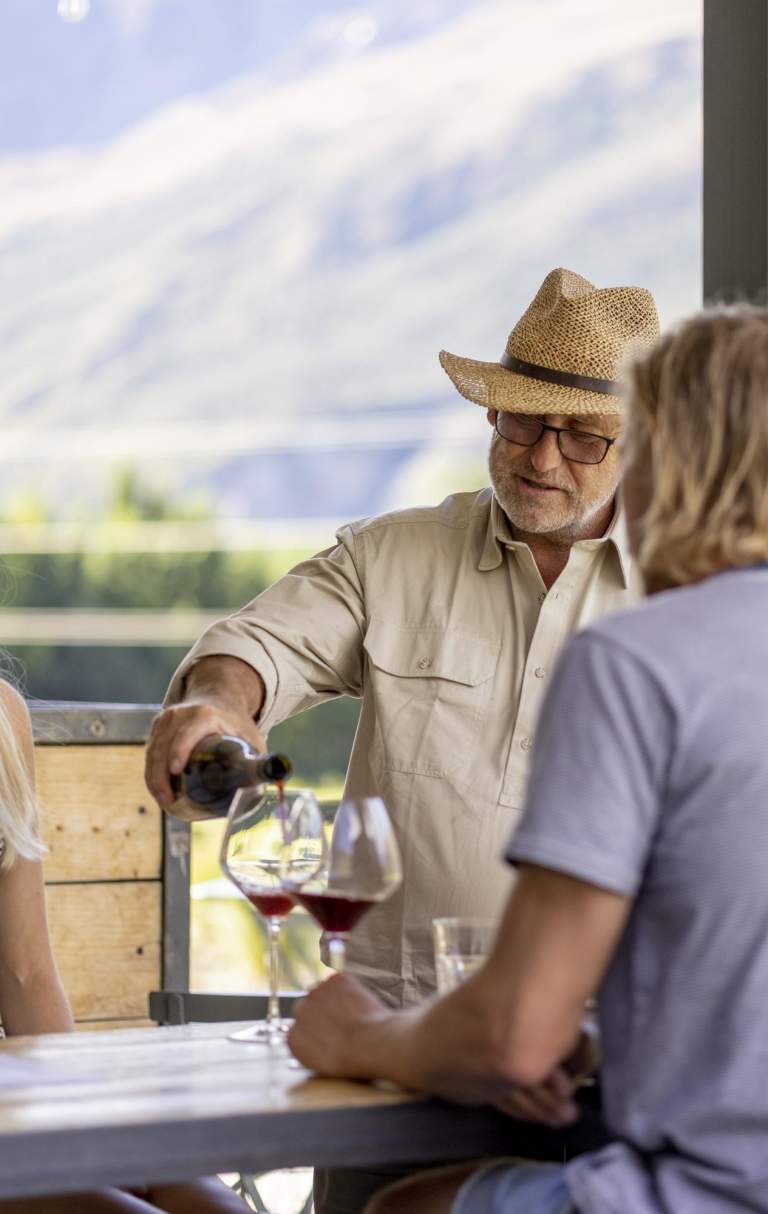 People enjoying a wine tasting in summer at Mt Rosa Wines