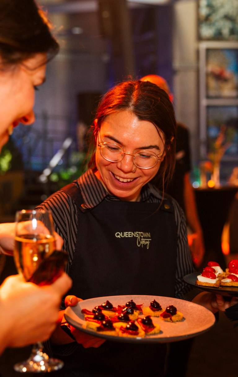 Catering serving canapes to guest