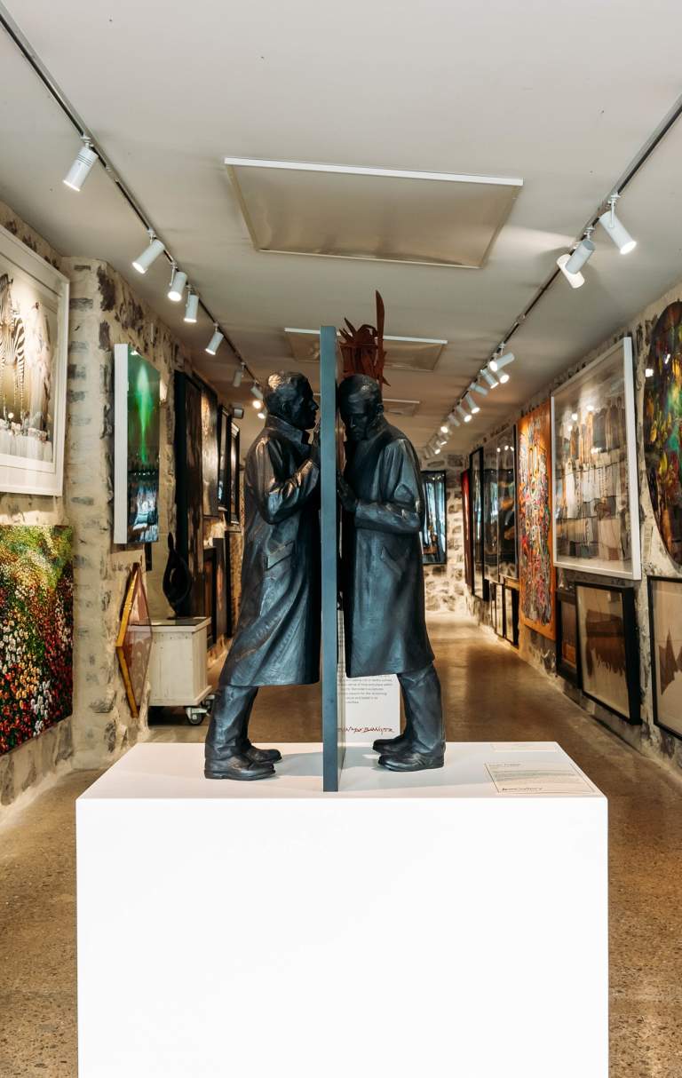 Interior shot with eclectic art at Art Bay Gallery