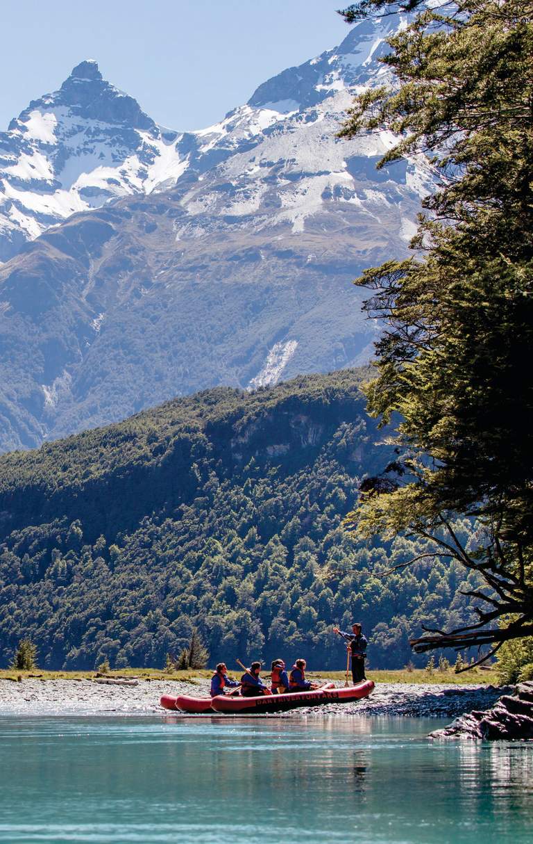 Group on Funyak tour with snow-capped mountains in the background