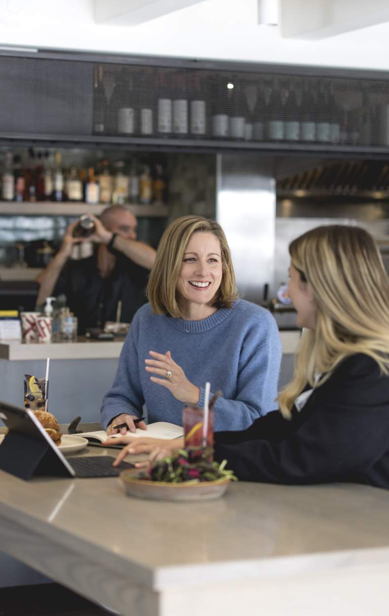 Two ladies working on laptops at The Dishery, Arrowtown
