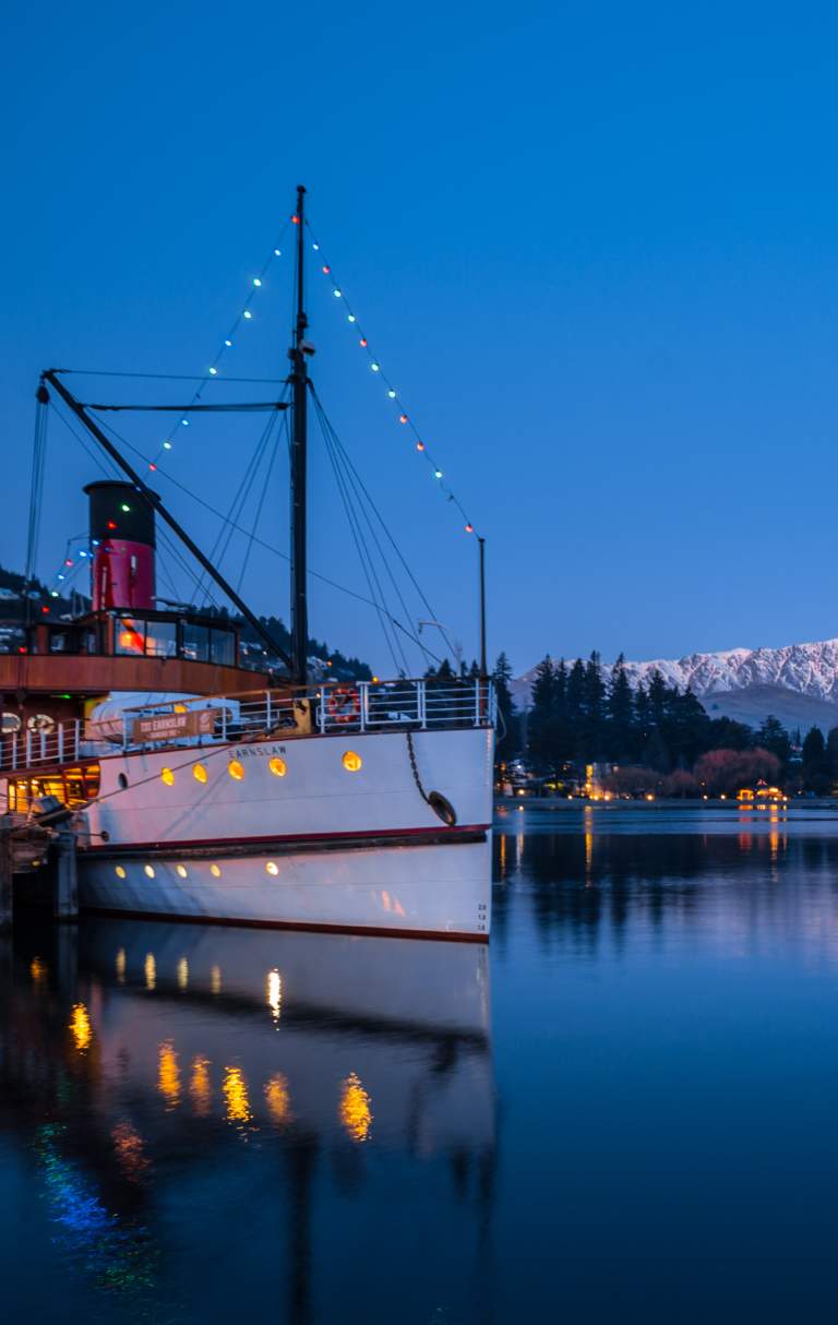 TSS Earnslaw Vintage Steamship in front of The Remarkables