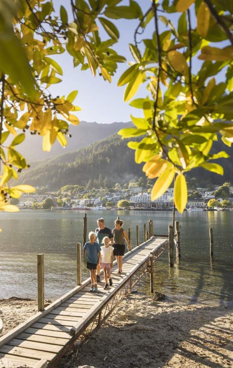 Family walking on pier