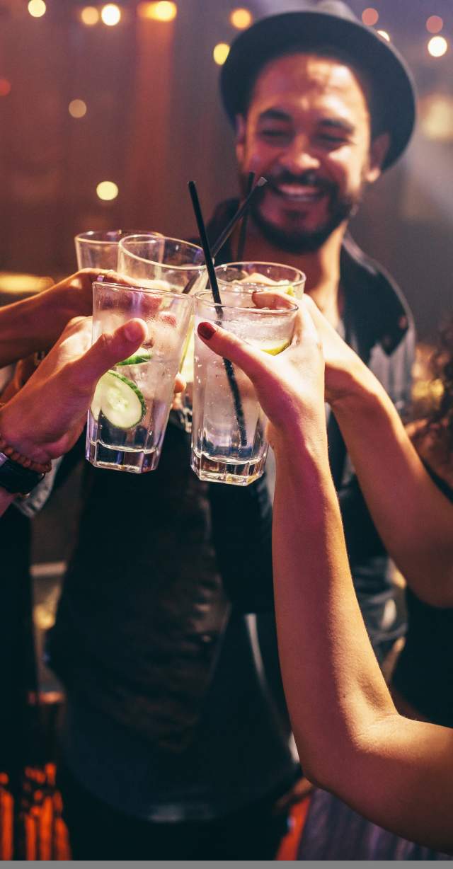 Group of people toasting at an event