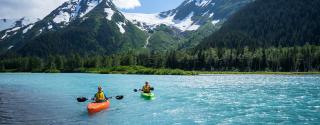 A couple kayaking on Explorer Lake
