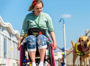 A wheelchair user and their dog on the Grand Pier at Weston-super-Mare near Bristol - credit The Grand Pier