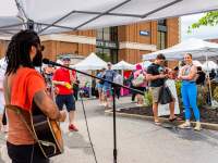 Musician plays at sunday on strawberry