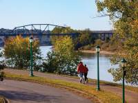 couple walking along the river