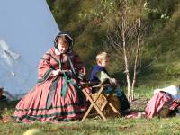 woman and boy dressed in period pieces