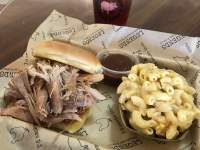 pulled pork sandwich and mac & cheese tray