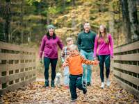 family on a trail in the fall