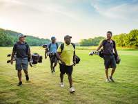 group of men on a golf course