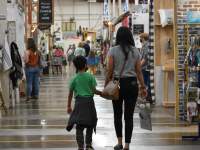 family shopping in an indoor market
