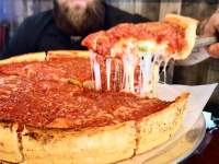 Cheesy deep-dish pizza from Camacho's