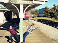 couple in front of a Clarksville train station