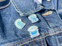 denim jacket with three collectible pins