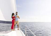Couple toasting on a sailboat in Charlotte Harbor, Florida