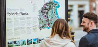 A couple looking at the Yorkshire Wolds Map, Market Weighton