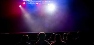 Photograph of a student night performance about to start at the New Theatre Royal in Portsmouth