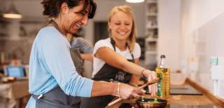 Two women at a cooking class in Bristol - credit Yuup