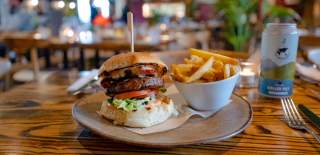 Burger and chips on plate