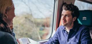 A man travelling on GWR train - Credit Great Western Railway