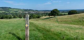 Cotswold Way fingerpost on footpath near Winchcombe