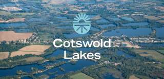 An aerial view of some of the Cotswold Lakes surrounded by fields