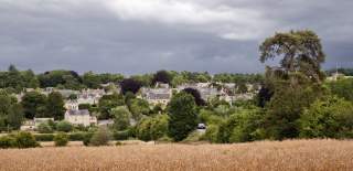 View across a corn field towards Charlbury