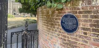 Millennium trail blue plaque at Christchurch Priory