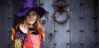 Child dressed up as a witch at Sudeley Castle in Cheltenham.
