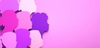 Silhouettes of women's faces on a purple background