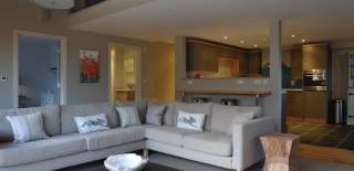 An open plan living room and kitchen at Notgrove Holidays