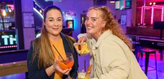 Girls Drinking in a bar - cocktails