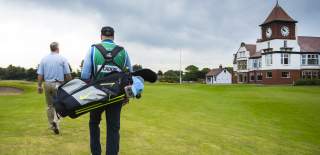 Golfer and Caddy