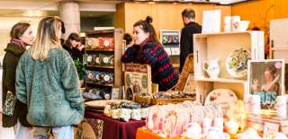 A market trader and 2 customers at the Made in Bristol gift fair - credit Jo Hounsome
