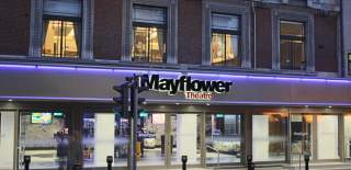 Mayflower Theatre frontage at night all lit up