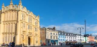 View of Market Place in Cirencester in late Autumn sunlight