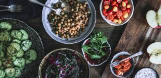 Photograph showing an array of vegetarian and vegan dishes