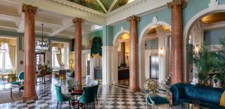 The glamorous and ornate lobby area at the Queens Hotel in Southsea